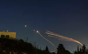 Hezbollah fires dozens of rockets at Israel