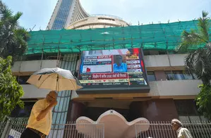 Sensex closes flat amid volatile session