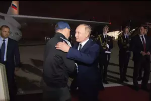 Putin meets Russian citizens freed after prisoner swap at Moscow airport