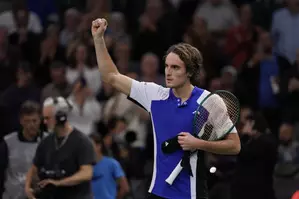 Tsitsipas overcomes stomach ache win in Paris opener