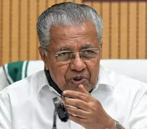 Pinarayi Vijayan suspends two Kerala IAS officials