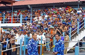 Pilgrims throng Sabarimala temple on opening day of long festive season