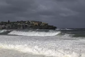 Storm hits Australia, causing property damage, flights cancellation