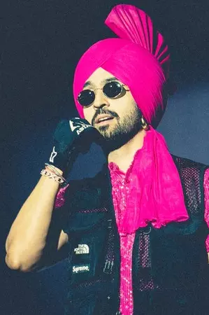 Diljit Dosanjh notices fans watching Ahmedabad show from hotel  balcony without tickets, pauses show