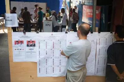 Indonesians flock to first-ever simultaneous regional polls