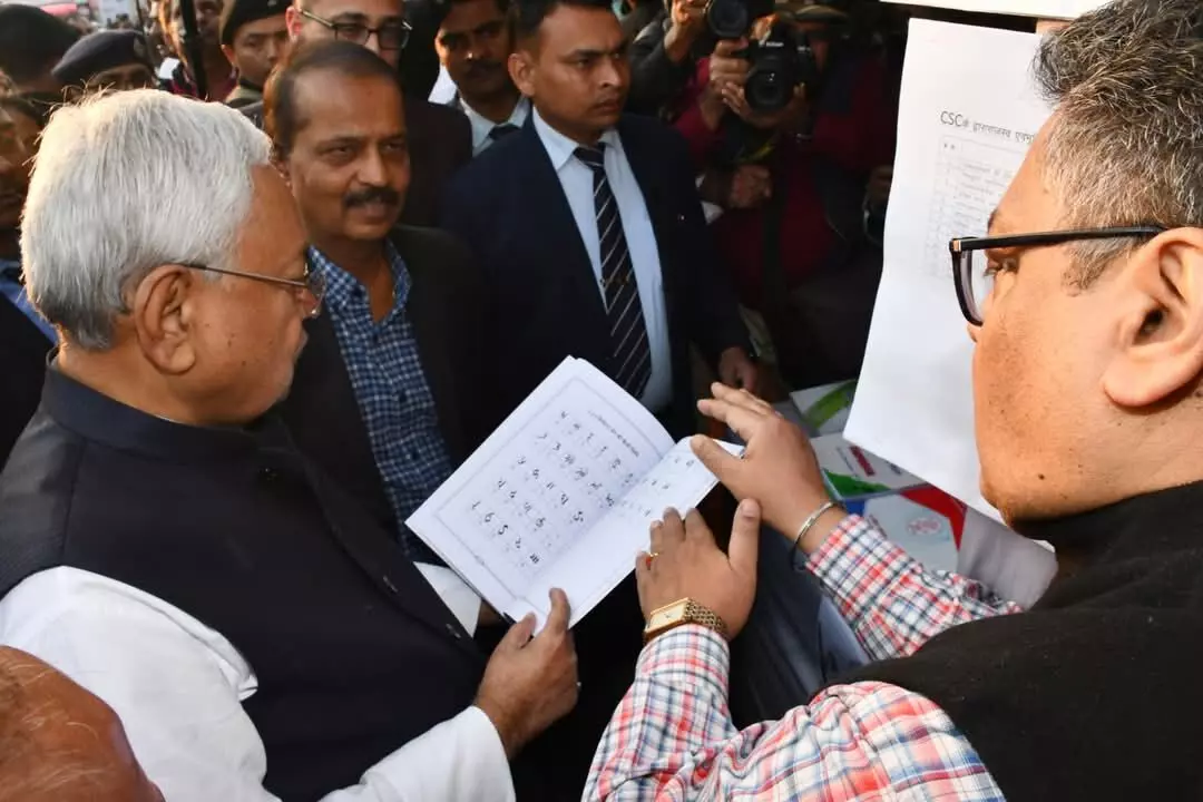 Bihar CM Nitish Kumar Reviews Kaithi Script Booklet at Revenue Department Stall