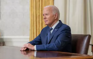 Biden signs plan to fund US government