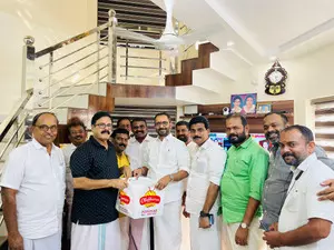 Kerala BJP Presidents cake diplomacy creates ripples in Thrissur