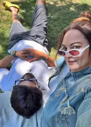 Zaheer Iqbal rests his head on Sonakshis lap as they soak in sun