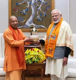 UP CM Yogi Adityanath meets PM Modi, invites him to Maha Kumbh Mela 2025