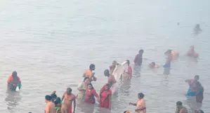 Devotees take dip in rivers in Himachal to mark Makar Sankranti