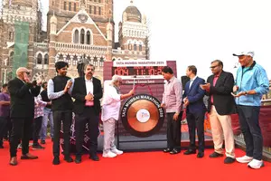 Striking the Gong in support of landmark 20th edition of Mumbai Marathon