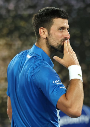 Aus Open: Djokovic breaks Federers record for most Grand Slam matches played with win over Faria