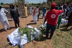 Nigeria holds mass funeral as tanker explosion death toll rises to 86 (Lead)